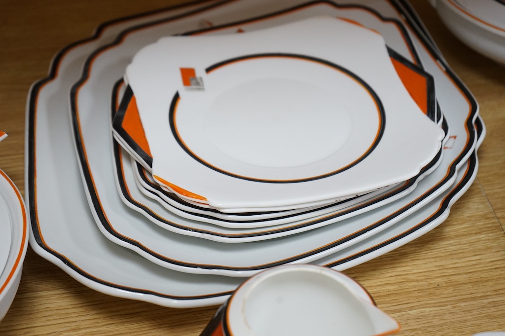 A Shelley ‘Vogue’ orange comprehensive dinner service. Largest platter 44cm wide. Condition - some enamelling worn or missing